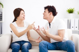 Quarrel between girlfriend and boyfriend in living room