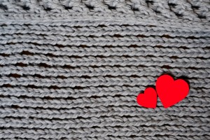 Handmade Grey Knitting Wool Texture Background With Red Hearts
