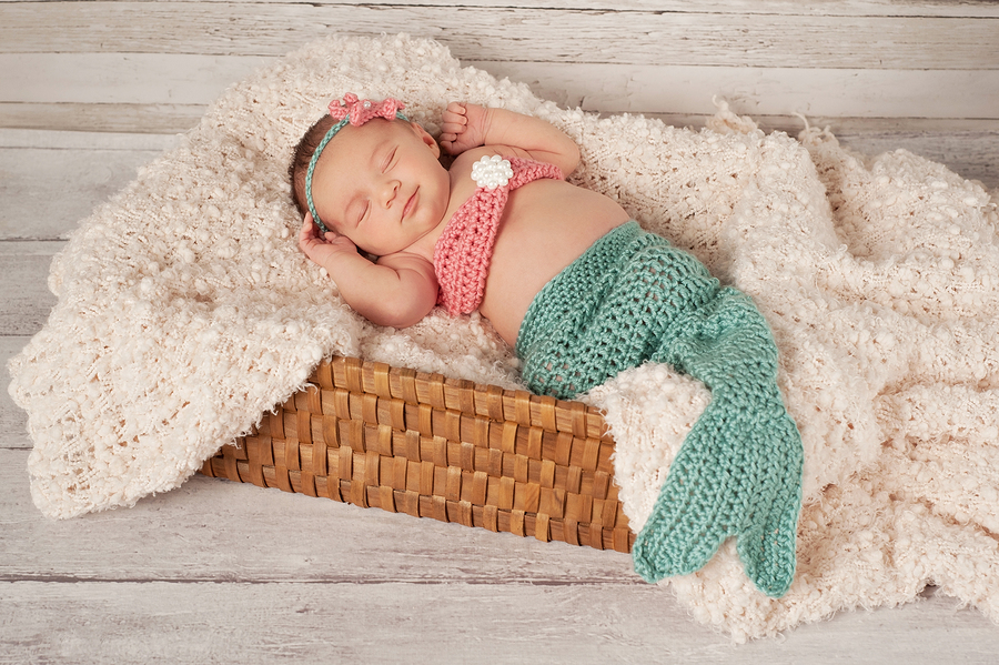 Smiling Newborn Baby Girl In A Mermaid Costume