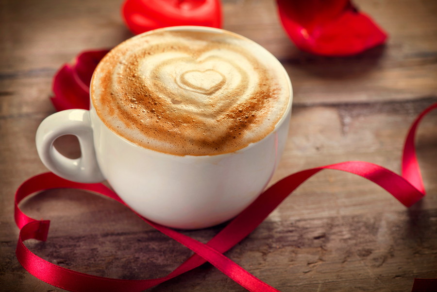 Valentine's Day Coffee with heart on foam. Heart drawing on capp