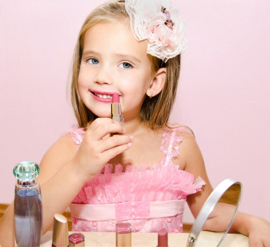 Child Cosmetics  Cute Little Girl With Lipstick