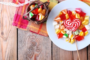 Plate And Basket With Colorful Sweet Candies