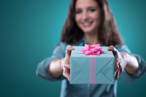 Girl Giving A Beautiful Gift