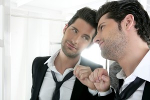 Handsome Narcissistic Young Man Looking In A Mirror