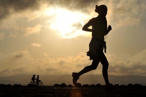 A runner makes her way across the Grand Bara Desert during the Annual Grand Bara 15K race Dec. 17, 2015, in Djibouti. More than 1,500 service members and civilians representing France, Djibouti, U.S., Japan, Germany and others participated in the race. (U.S. Air Force photo by Tech. Sgt. Dan DeCook)
